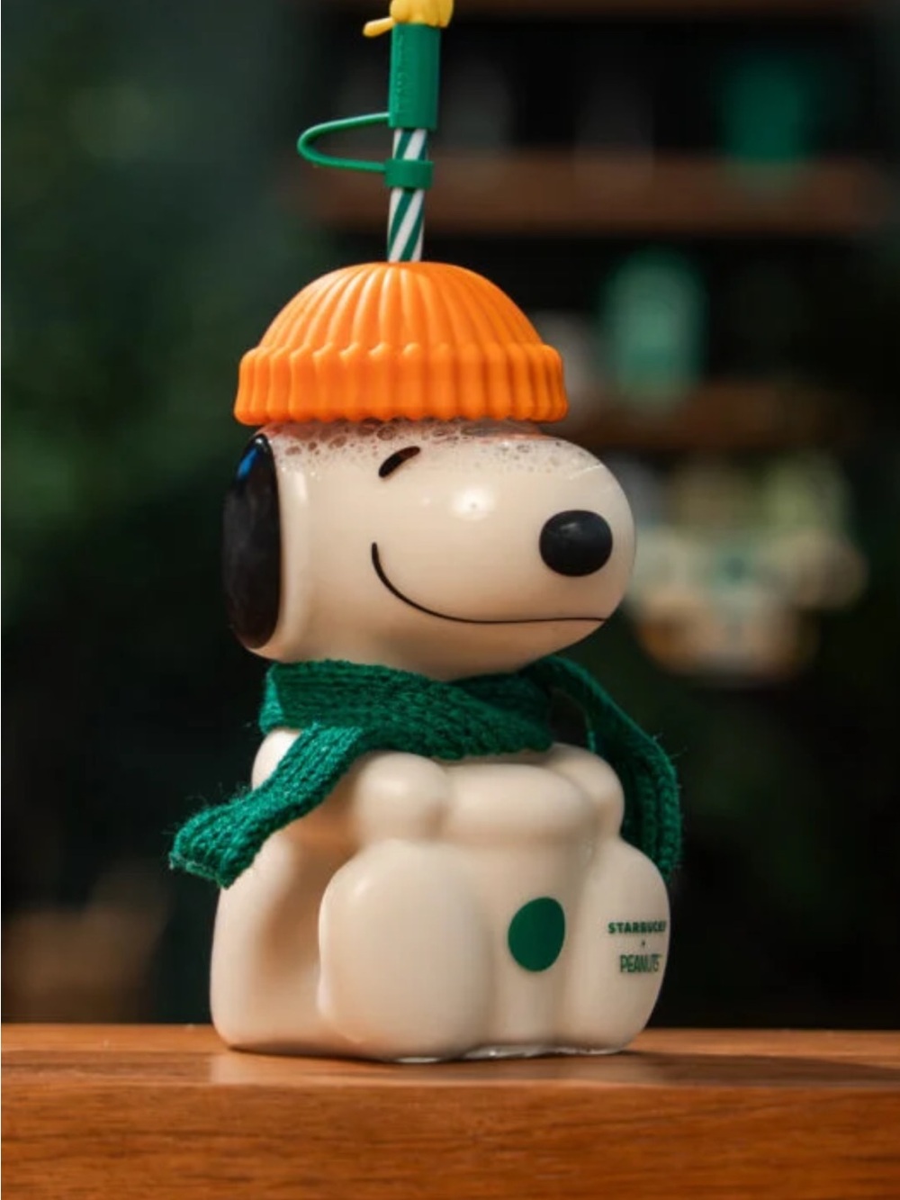 Starbucks Snoopy Figure in White with Orange Hat and Green Scarf